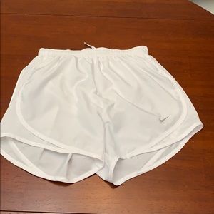 White Nike shorts